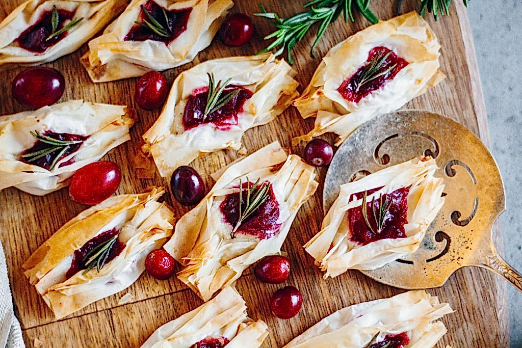 Vegan Cheesy Rosemary and Cranberry Bites by Taavi Moore of Healthie Nut